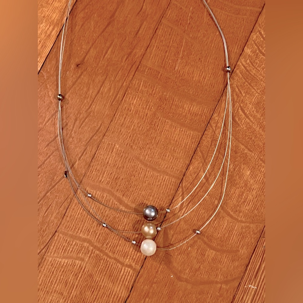 Three tiered faux pearl necklace